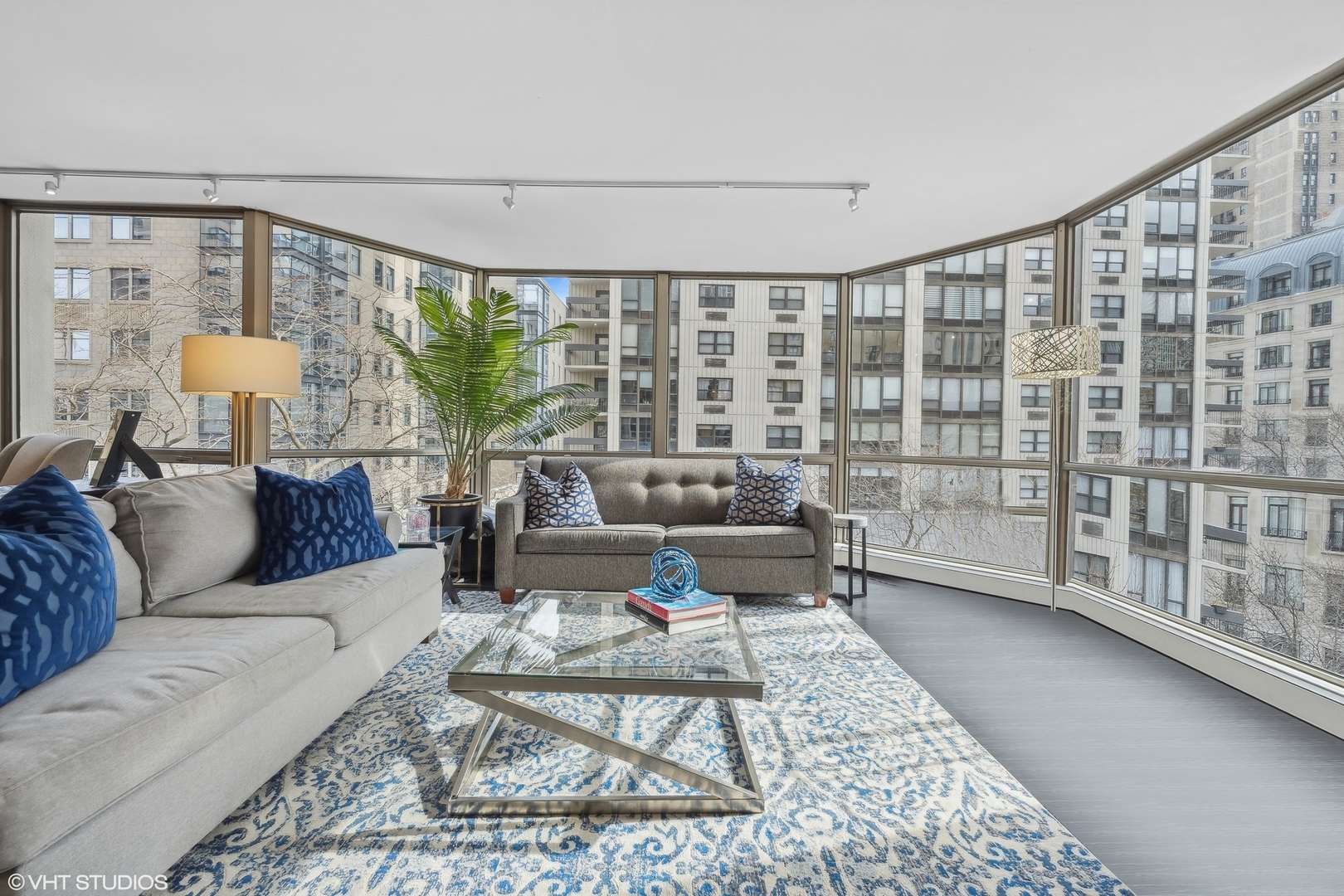 1310 North Ritchie Court, Unit 4C Chicago, IL 60610 - Photo 3 of 28 a living room with furniture and a floor to ceiling window