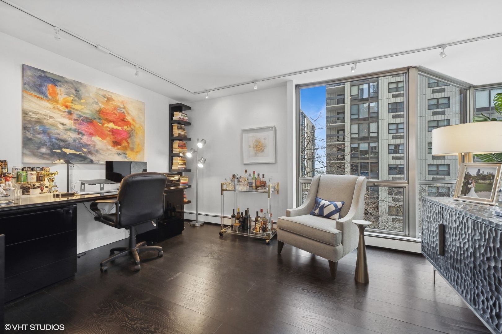 1310 North Ritchie Court, Unit 4C Chicago, IL 60610 - Photo 6 of 28 a living room with furniture and a large window