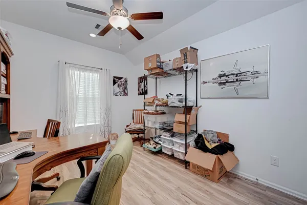 a view of a workspace with furniture and workspace