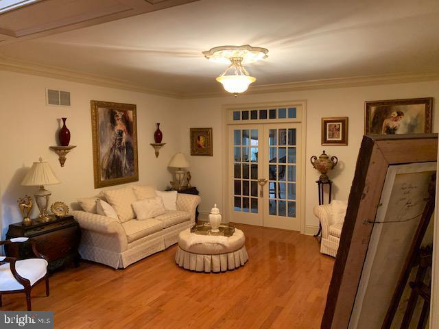 12 Pendleton Court Medford, NJ 08055 - Photo 15 of 24 a living room with furniture and a floor to ceiling window