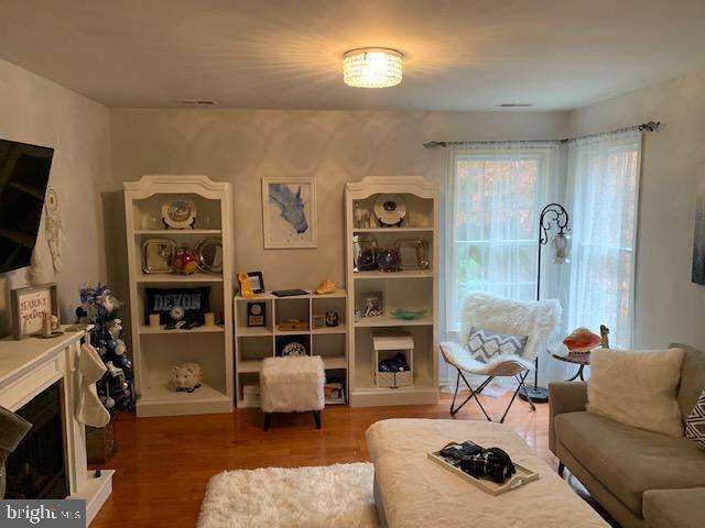 12 Pendleton Court Medford, NJ 08055 - Photo 18 of 24 a living room with furniture a window and a flat screen tv