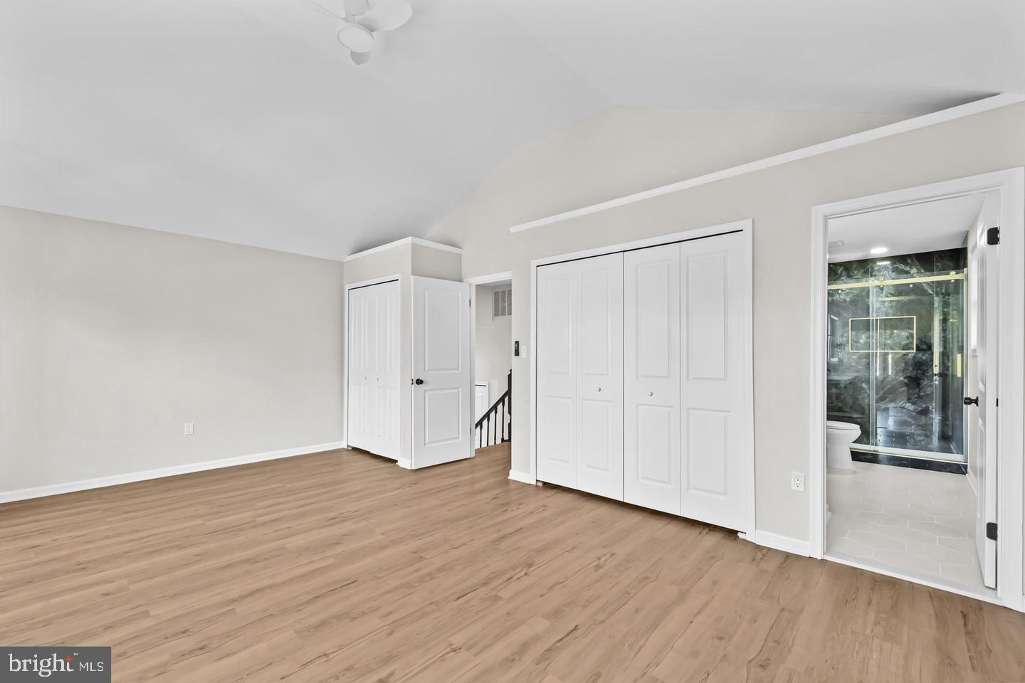 10290 South Grant Avenue Manassas, VA 20110 - Photo 22 of 41 a view of an empty room with wooden floor