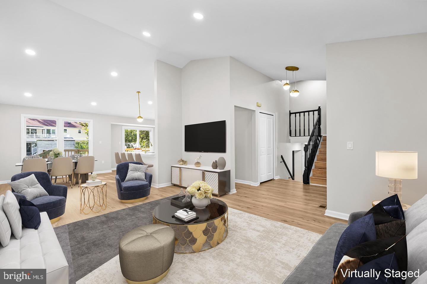 10290 South Grant Avenue Manassas, VA 20110 - Photo 7 of 41 a living room with furniture and a flat screen tv