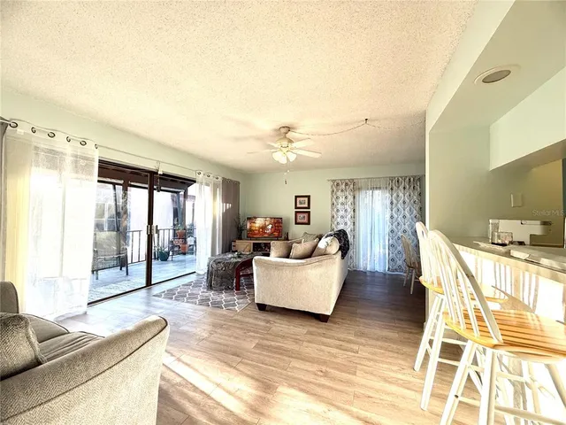 a dining room with furniture window wooden floor