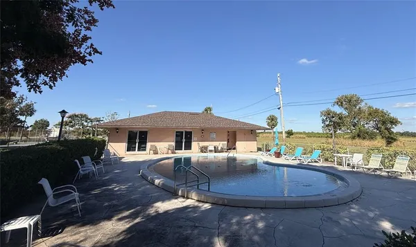 a view of a patio with a yard
