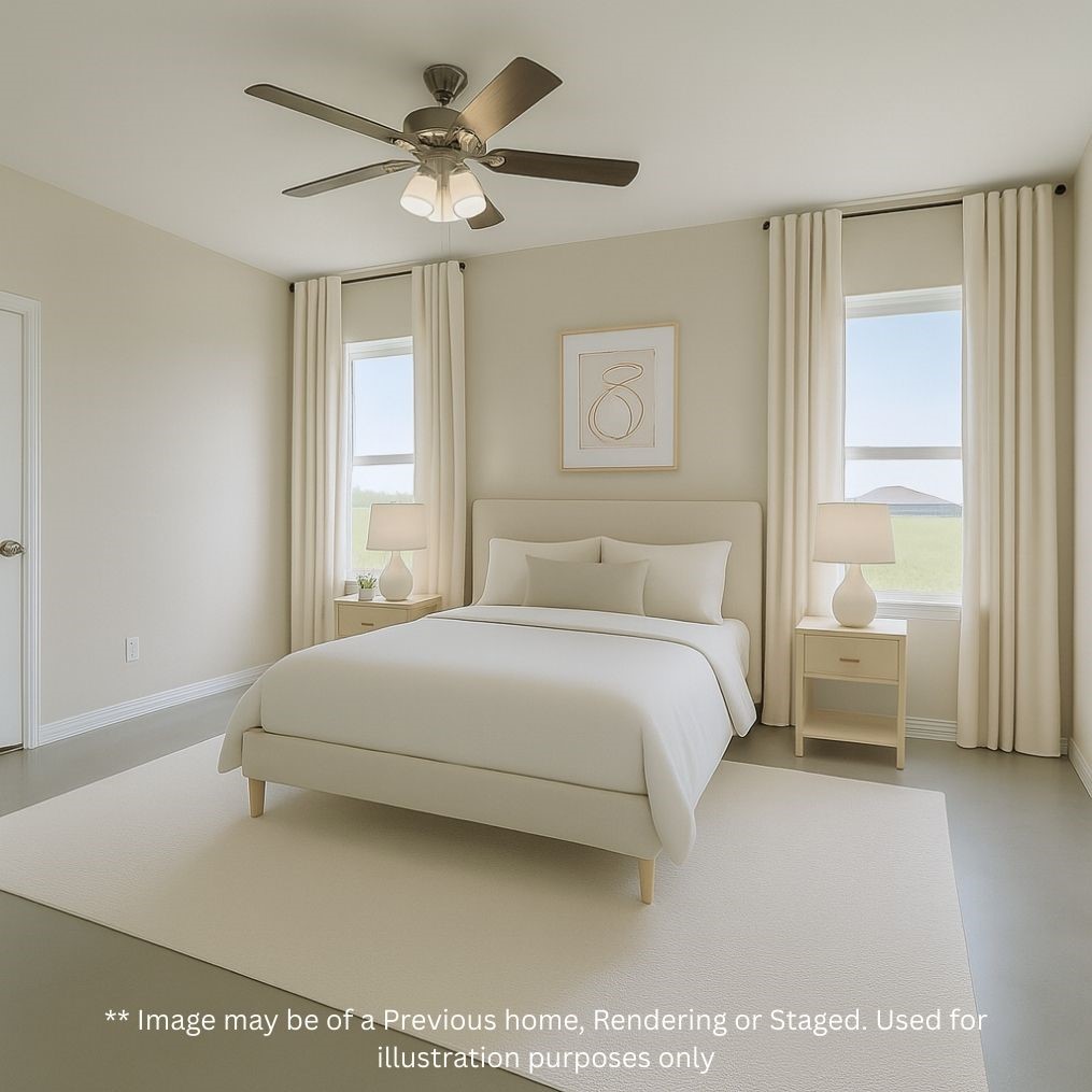 6 Greenway Drive Trinity, TX 75862 - Photo 11 of 28 a bedroom with a large bed and a chandelier