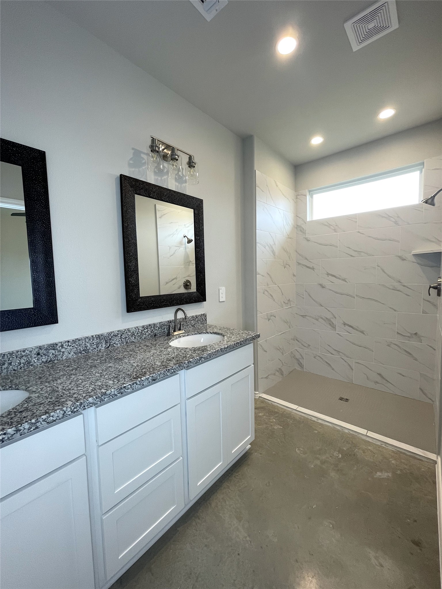 6 Greenway Drive Trinity, TX 75862 - Photo 14 of 28 a bathroom with a granite countertop sink mirror and bathtub