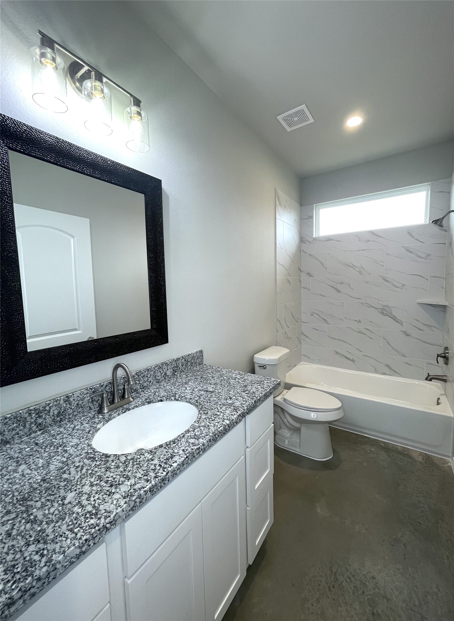 6 Greenway Drive Trinity, TX 75862 - Photo 21 of 28 a bathroom with a granite countertop sink a toilet and a bathtub