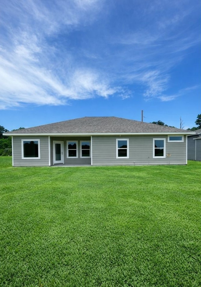 6 Greenway Drive Trinity, TX 75862 - Photo 28 of 28 a front view of a house with a garden