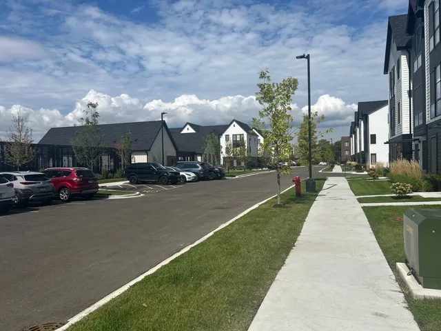a view of a room with lots of gym equipment
