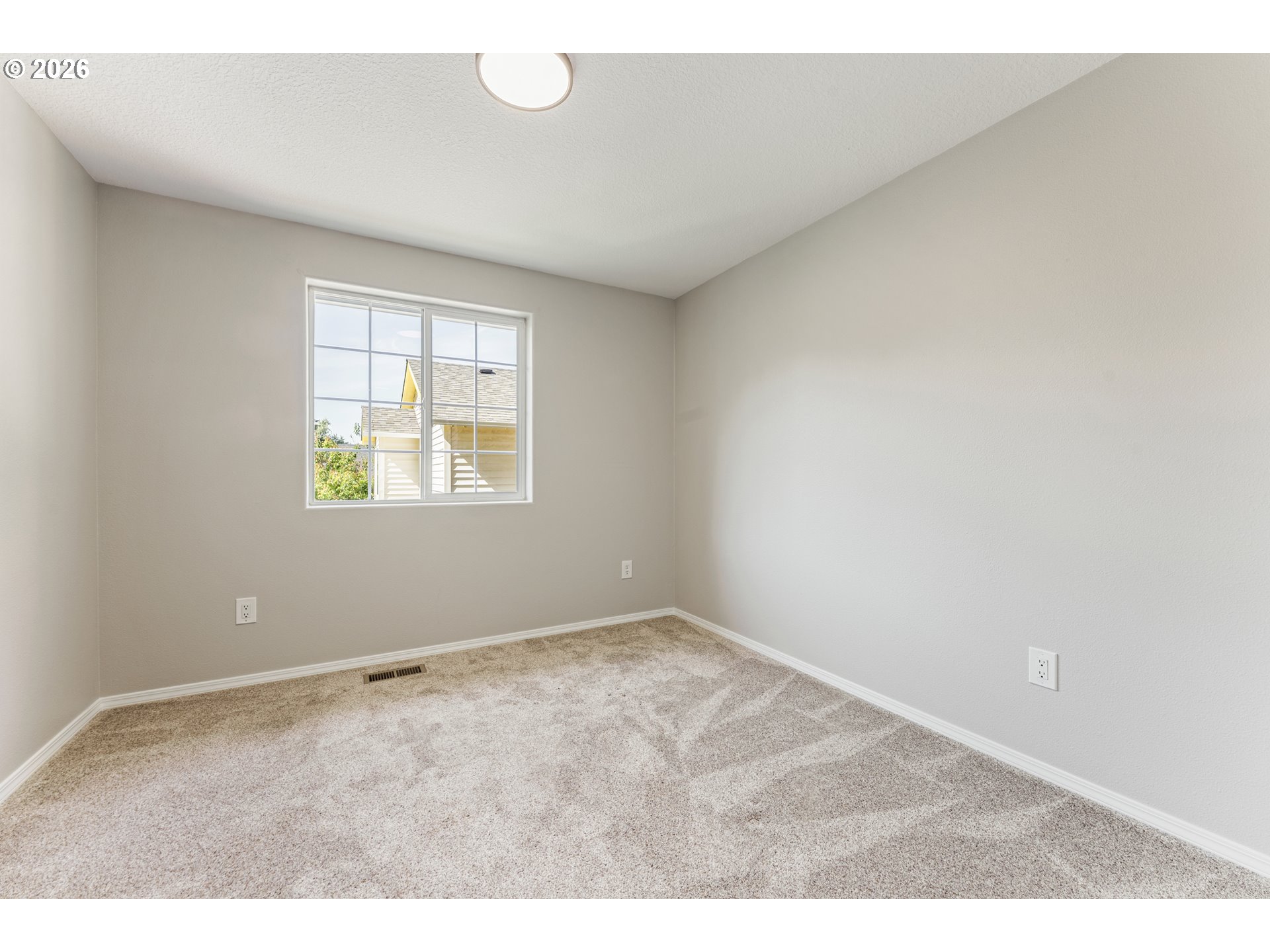 4024 Southeast 154th Place Portland, OR 97236 - Photo 17 of 43 an empty room with windows