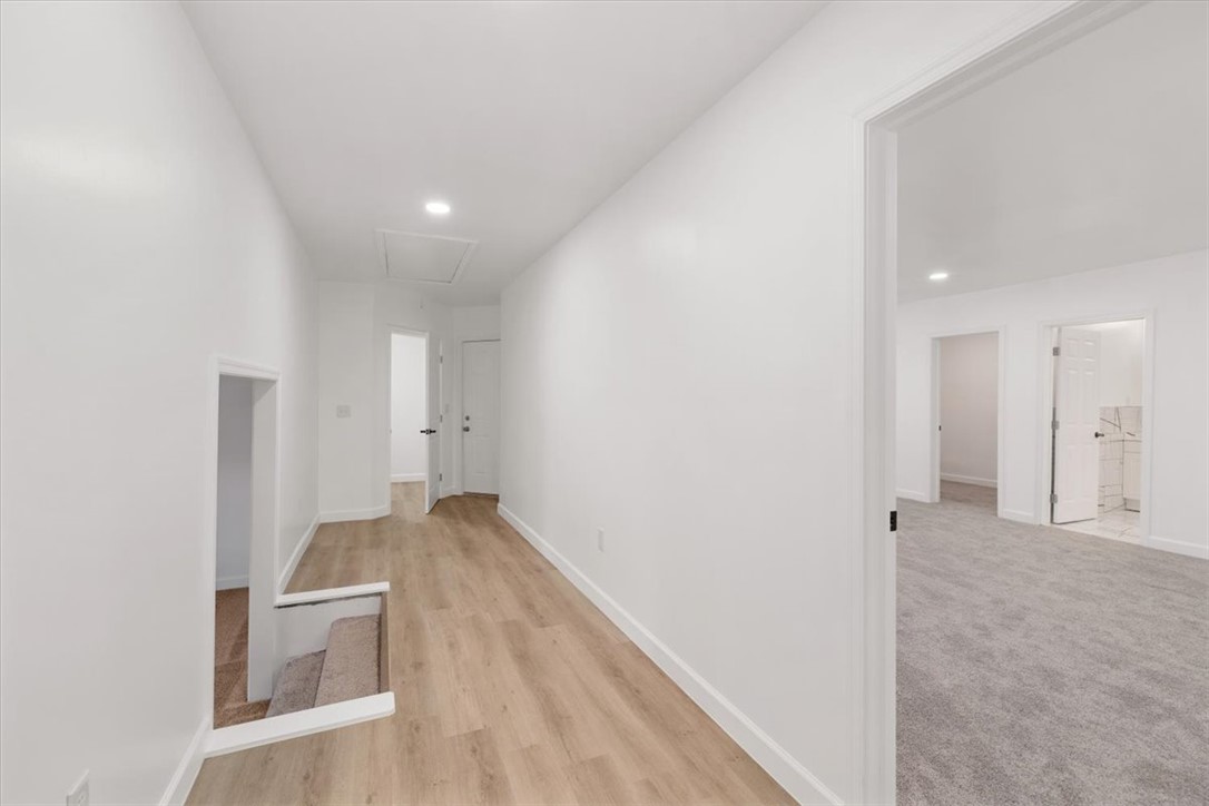 629 Little Meadow Drive Riverside, OH 45404 - Photo 26 of 48 This spacious hallway features luminous recessed lighting and durable wood flooring.