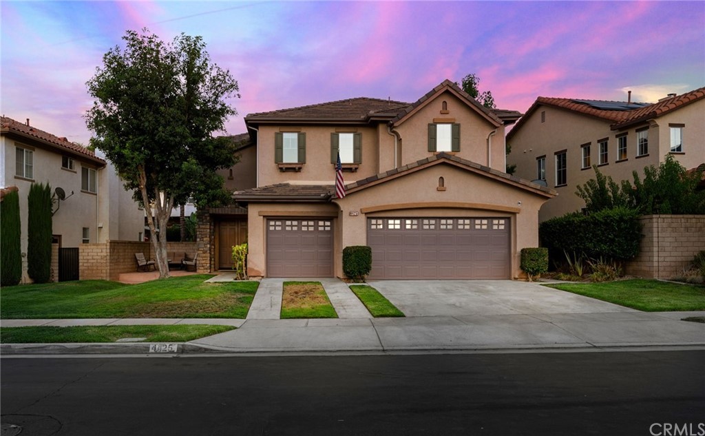 4425 Butler National Road Corona, CA 92883 - Photo 1 of 1 a view of a house with a big yard plants and large trees