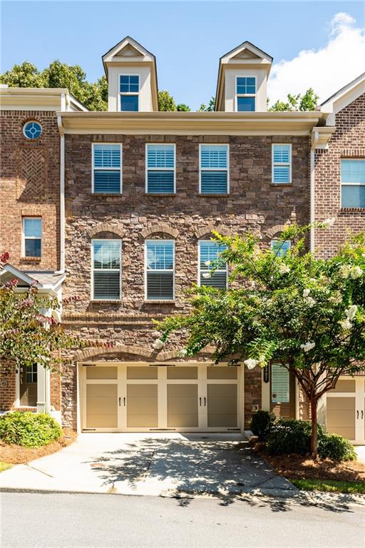 1367 Harris Way Street Brookhaven, GA 30319 - Photo 2 of 49 a front view of a house with a yard