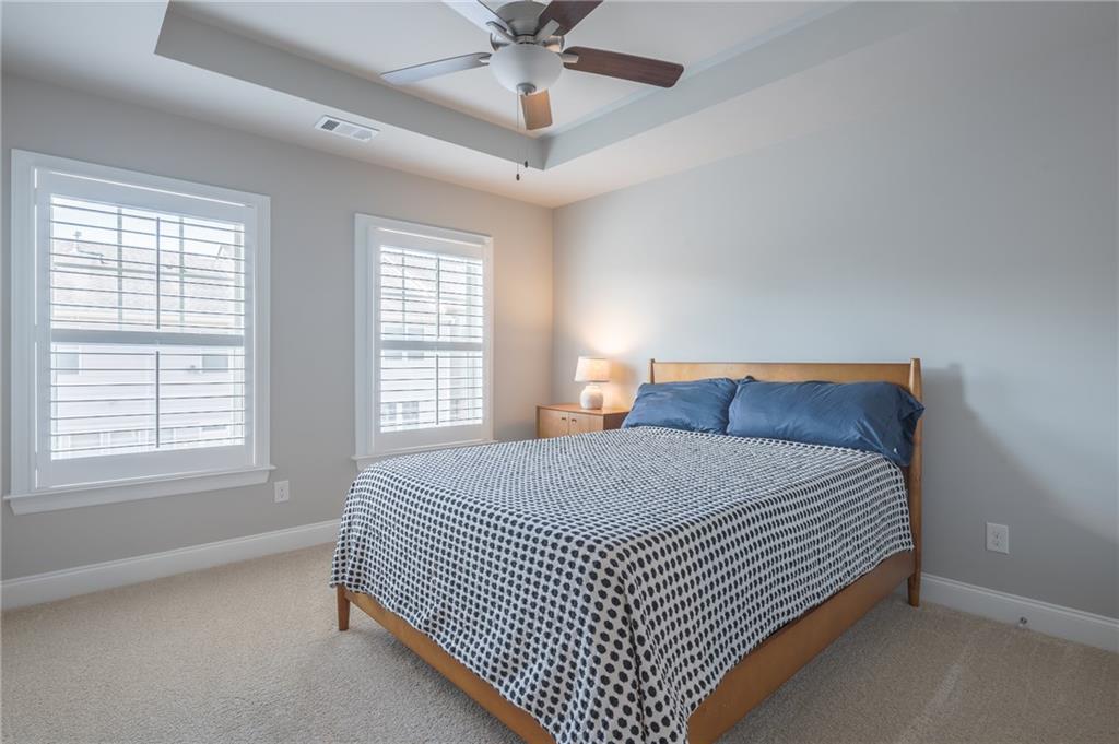 1367 Harris Way Street Brookhaven, GA 30319 - Photo 24 of 49 a bedroom with a bed and window