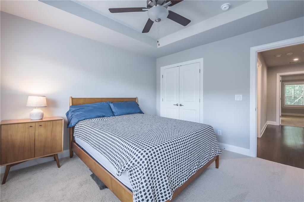 1367 Harris Way Street Brookhaven, GA 30319 - Photo 27 of 49 a bedroom with a bed and window