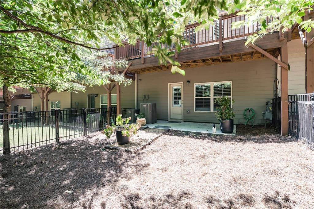 1367 Harris Way Street Brookhaven, GA 30319 - Photo 36 of 49 a view of a house with backyard and sitting area