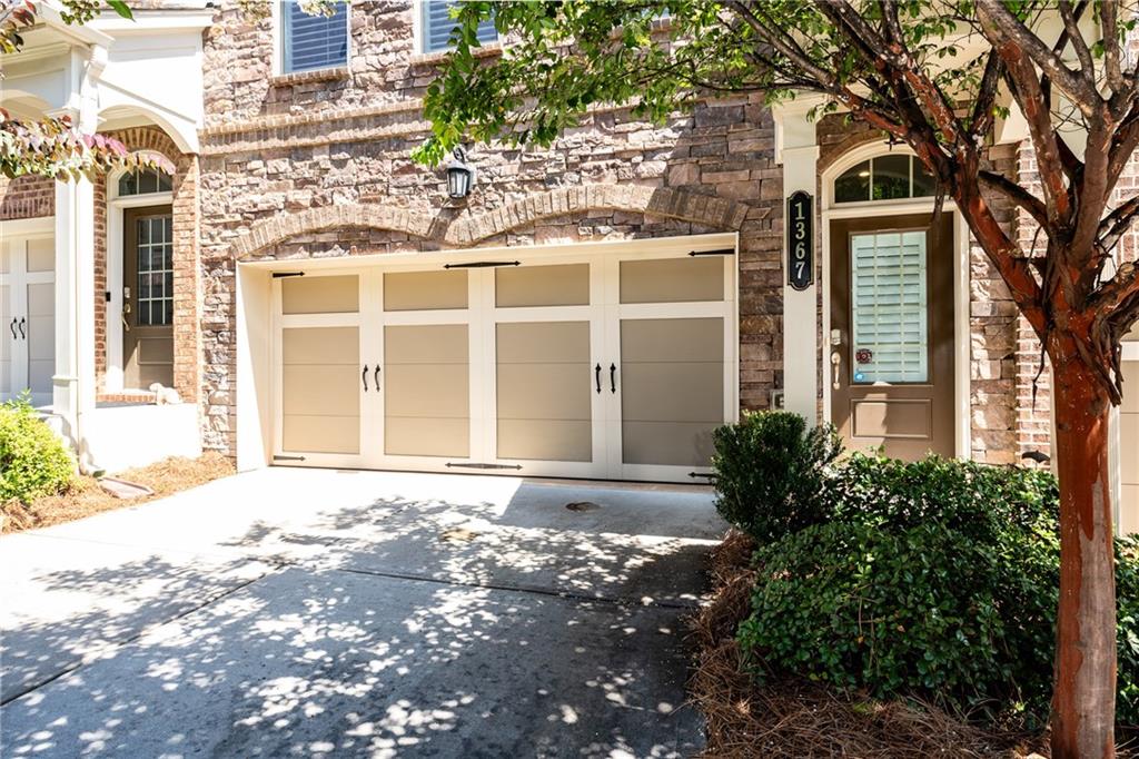 1367 Harris Way Street Brookhaven, GA 30319 - Photo 40 of 49 a front view of a house with a yard