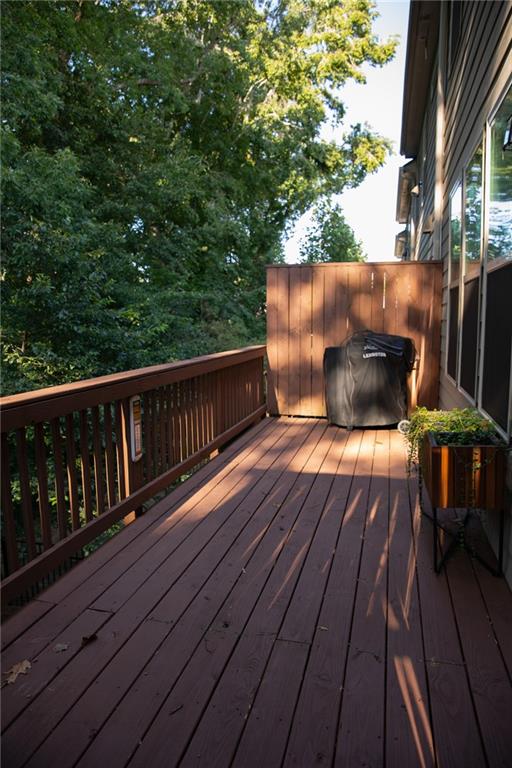 1367 Harris Way Street Brookhaven, GA 30319 - Photo 43 of 49 a view of deck with wooden floor and seating space