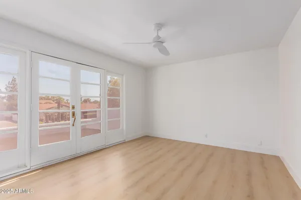 an empty room with windows