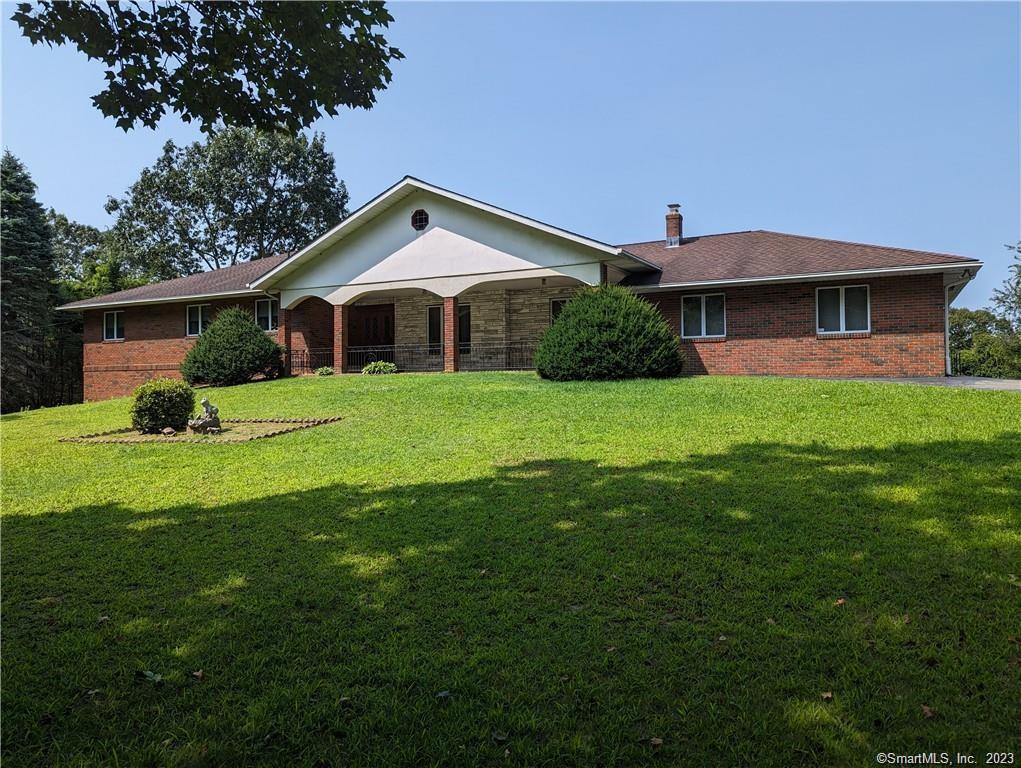 99 Academy Hill Road Derby, CT 06418 - Photo 1 of 1 a front view of a house with yard and green space