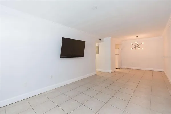 a view of a livingroom with wooden floor