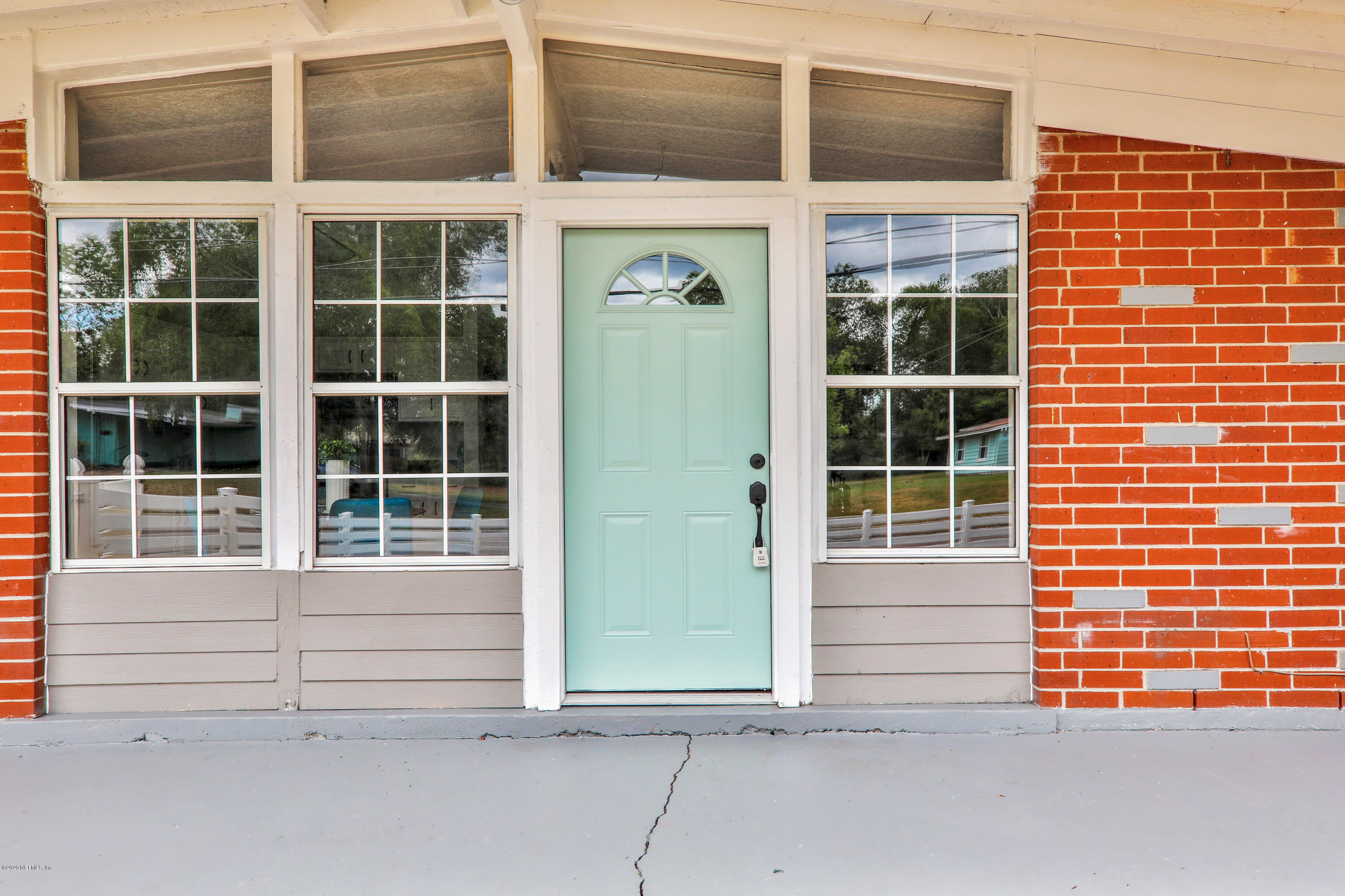 7359 Sandhurst Road South Jacksonville, FL 32277 - Photo 2 of 34 a view of front door