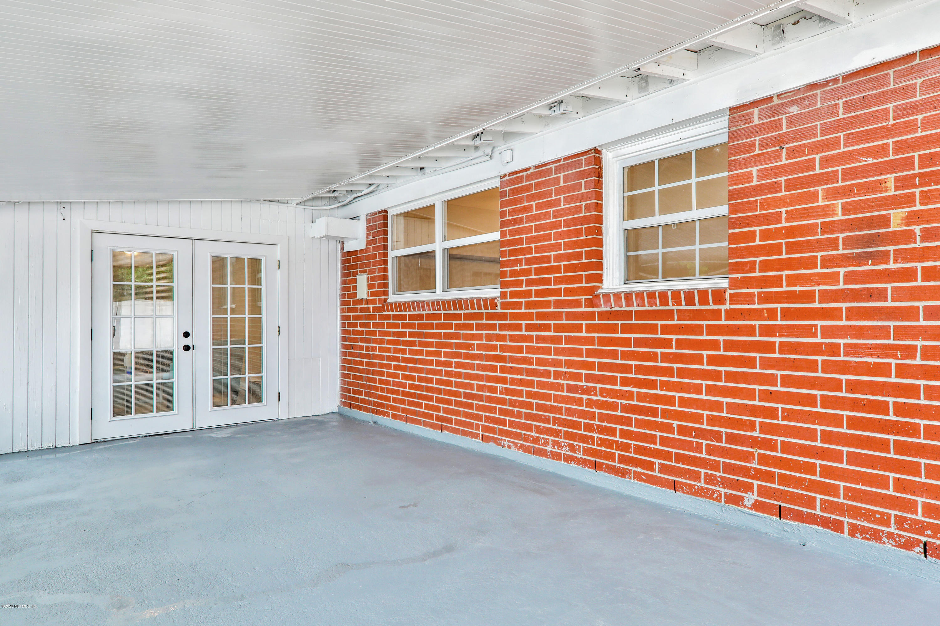 7359 Sandhurst Road South Jacksonville, FL 32277 - Photo 30 of 34 a view of an outdoor space with windows