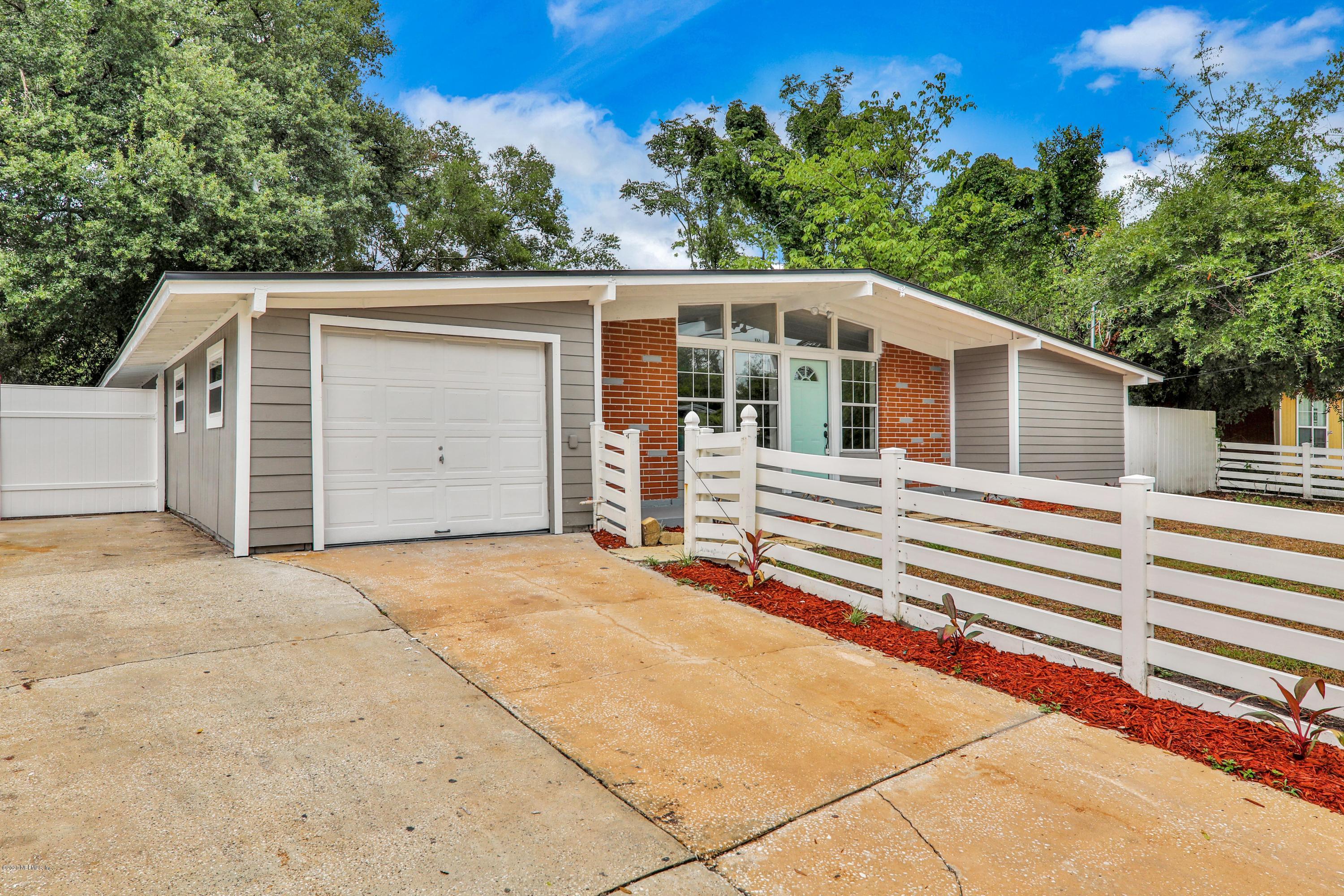 7359 Sandhurst Road South Jacksonville, FL 32277 - Photo 34 of 34 a front view of a house with a garage