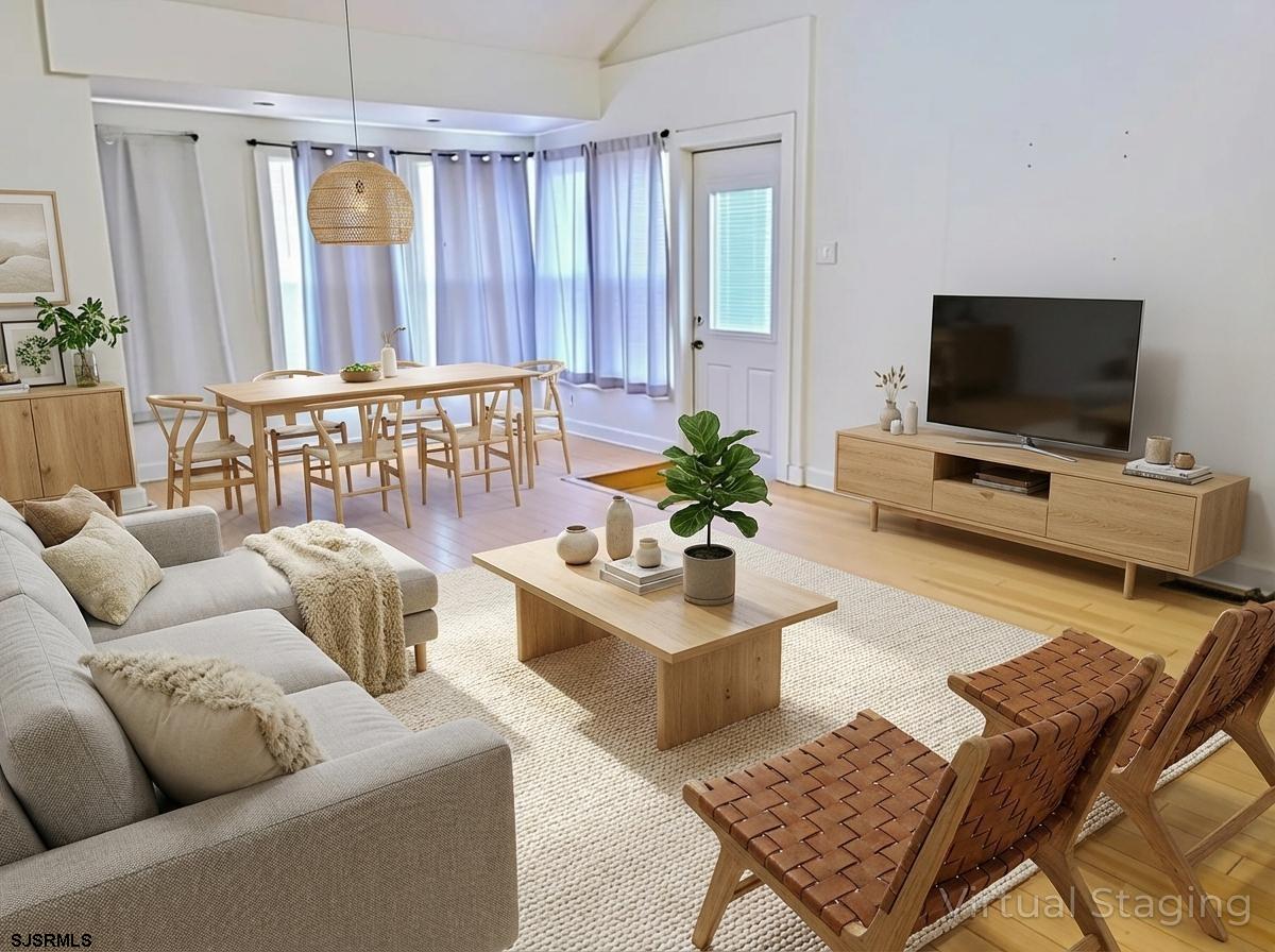 711 Wisteria Road Chelsea Heights, NJ 08401 - Photo 11 of 26 a living room with furniture and a flat screen tv