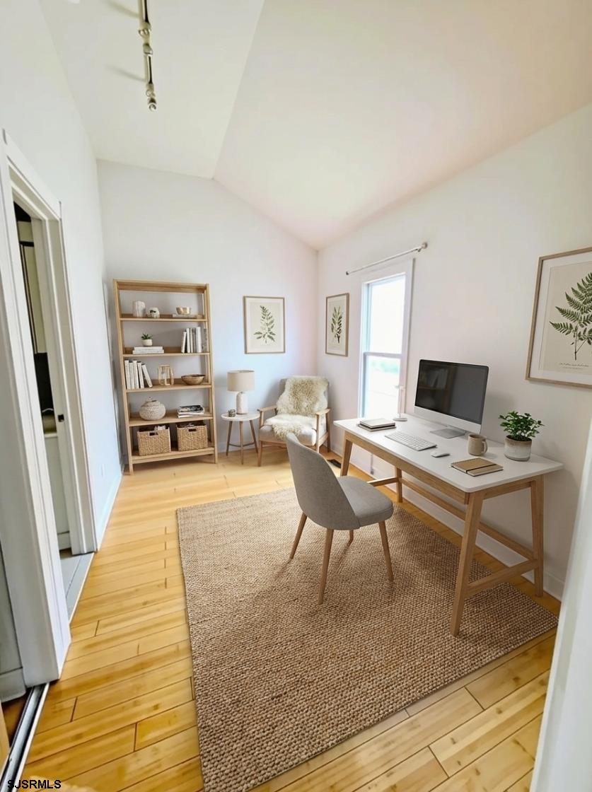 711 Wisteria Road Chelsea Heights, NJ 08401 - Photo 13 of 26 a living room with furniture and a table