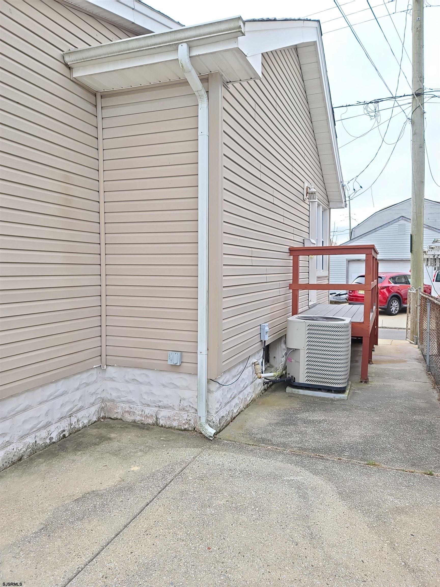 711 Wisteria Road Chelsea Heights, NJ 08401 - Photo 17 of 26 a view of a car garage gate