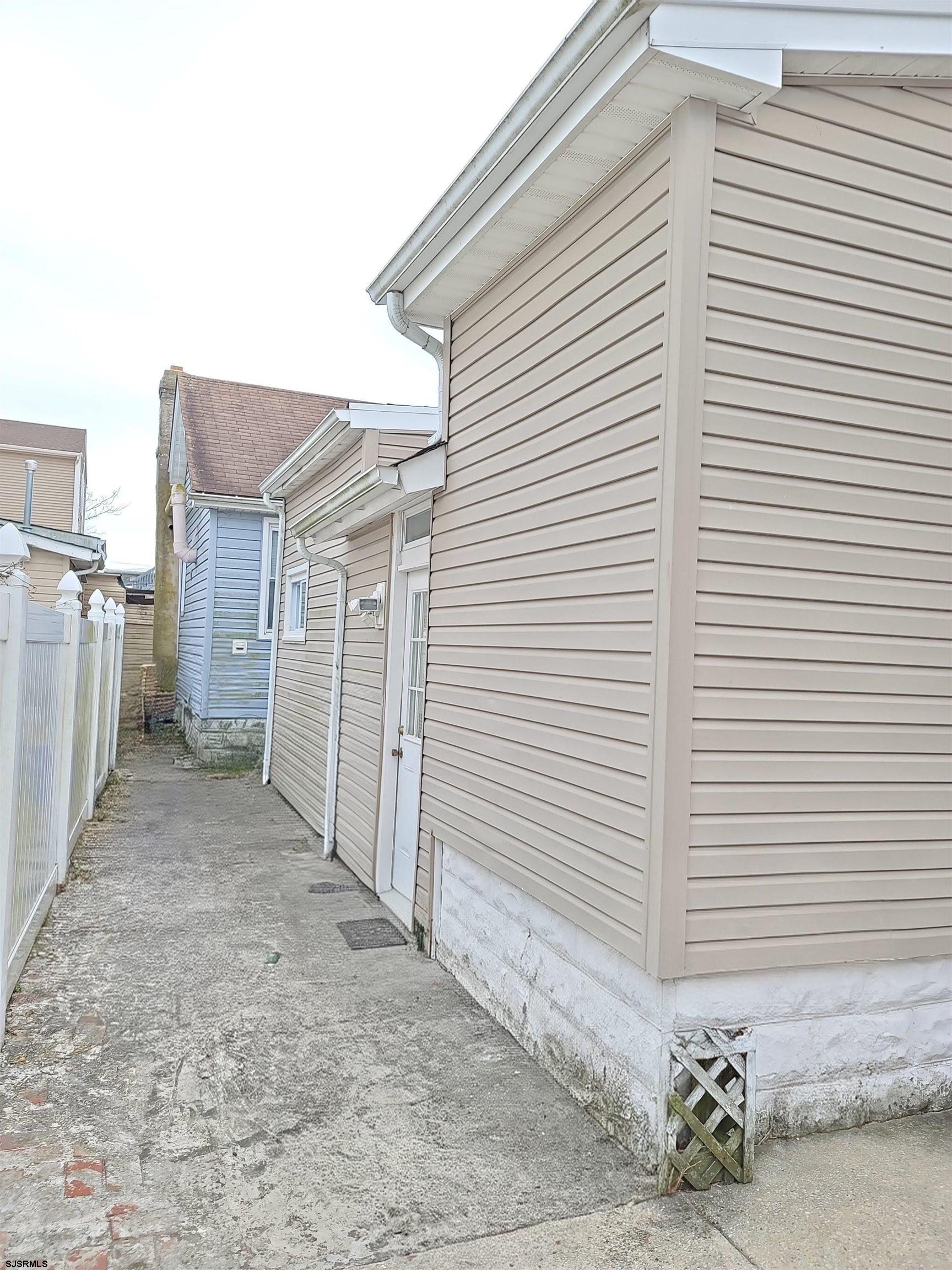 711 Wisteria Road Chelsea Heights, NJ 08401 - Photo 18 of 26 a view of a house with backyard