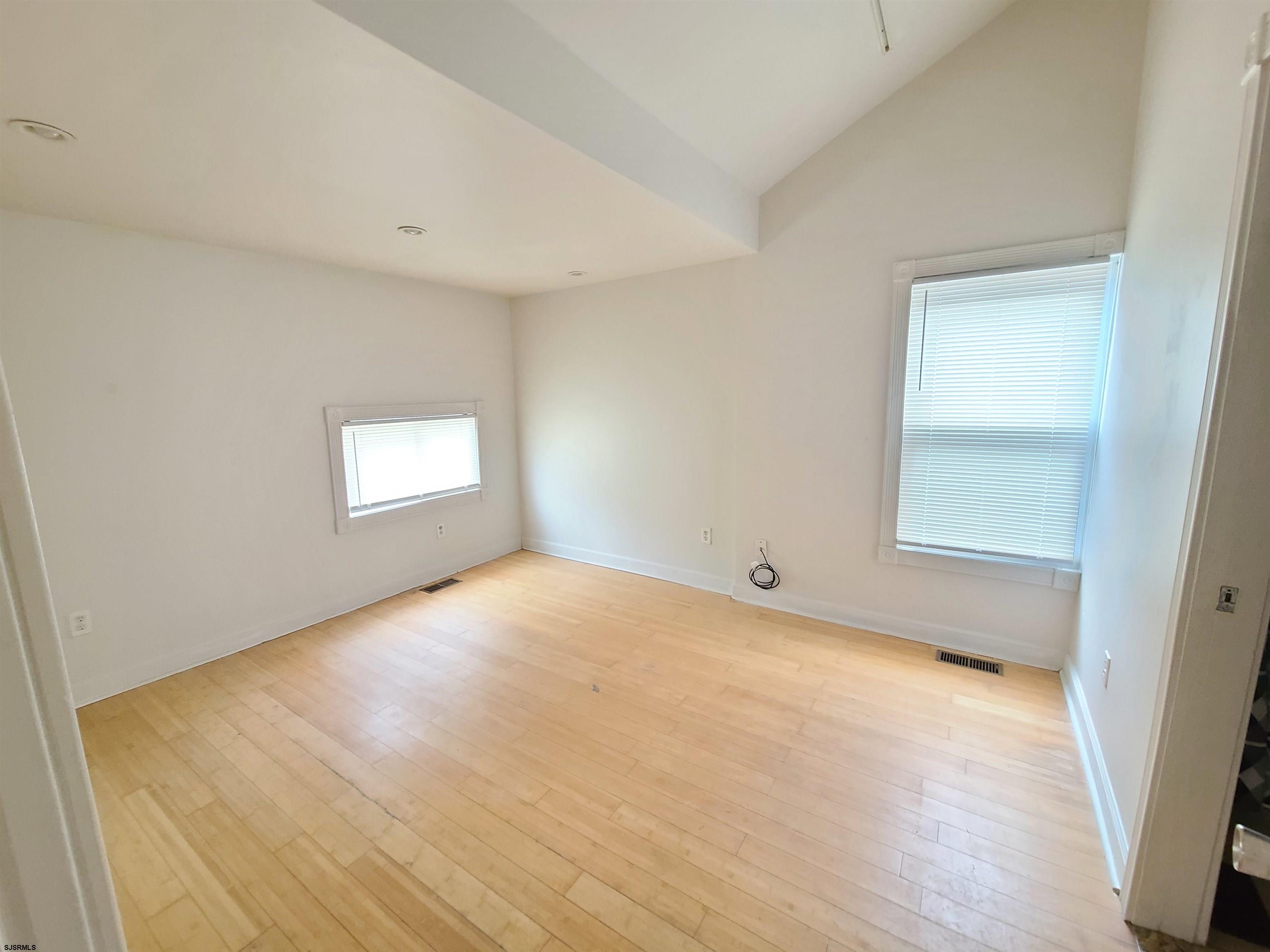 711 Wisteria Road Chelsea Heights, NJ 08401 - Photo 7 of 26 a view of an empty room and a window