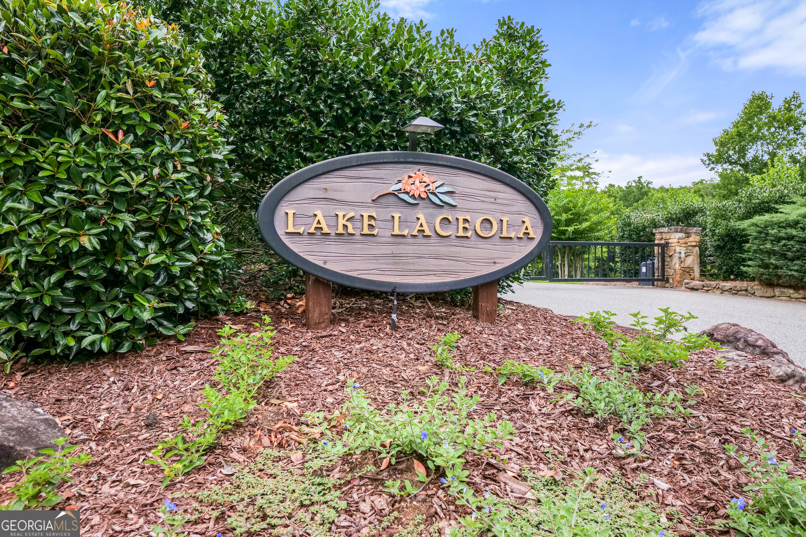 Lot 239 Shore Drive Cleveland, GA 30528 - Photo 13 of 13 a view of a back yard with a fountain