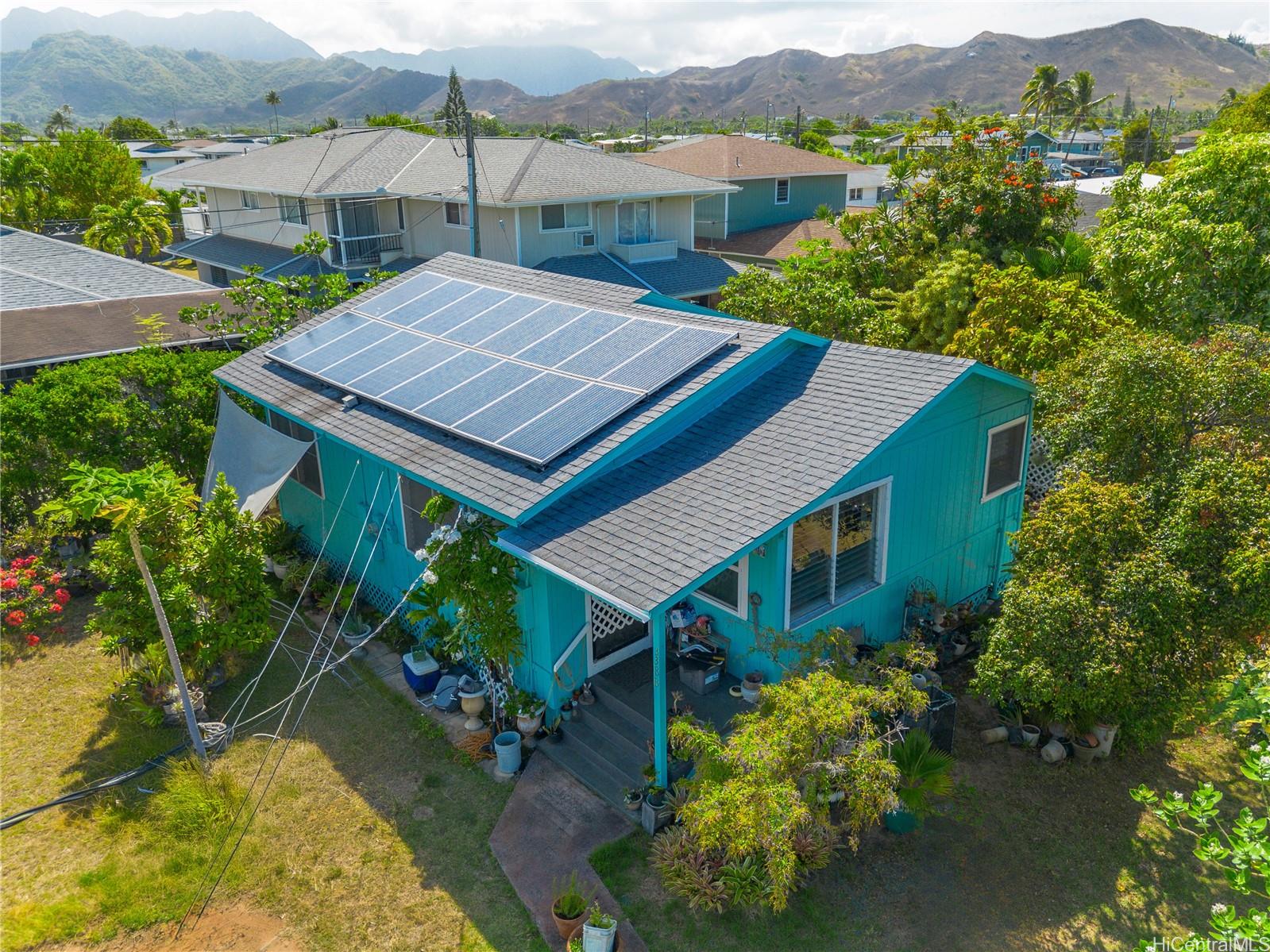 338 Manono Street, Unit B Kailua, HI 96734 - Photo 1 of 25 an aerial view of a house with yard swimming pool and mountain view