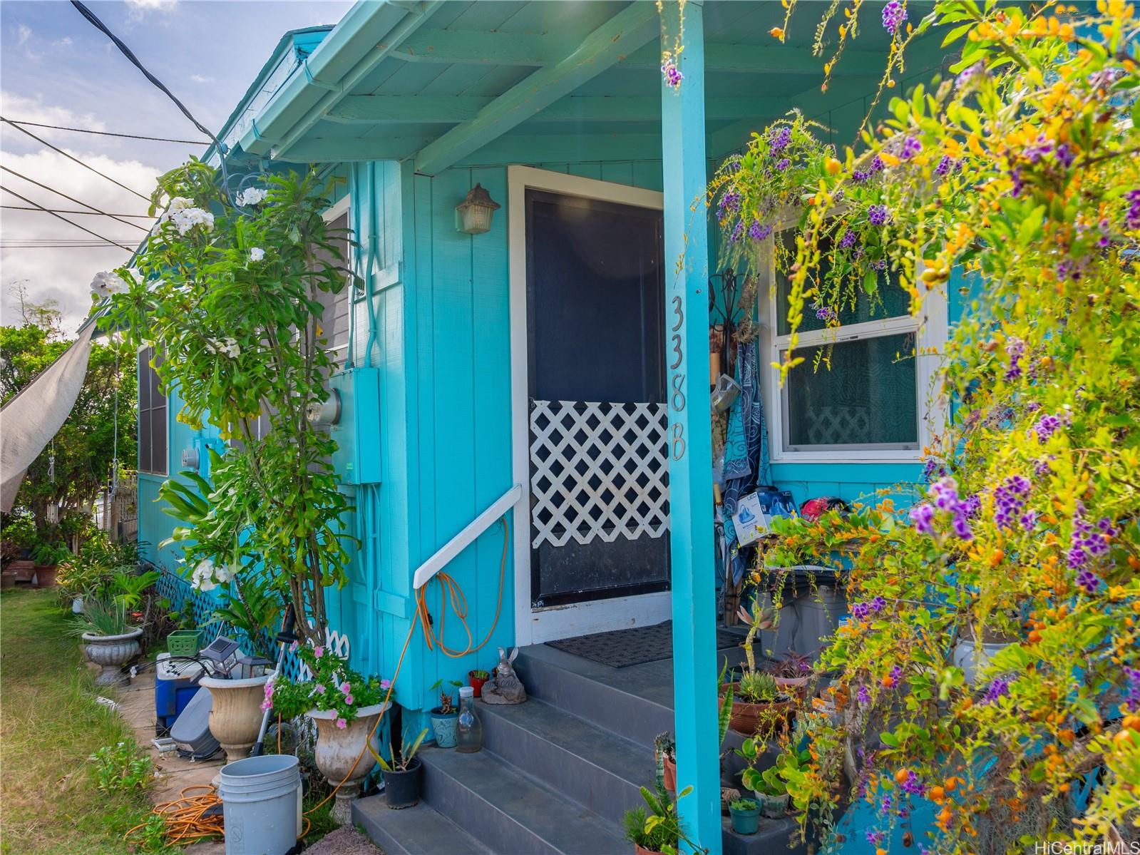 338 Manono Street, Unit B Kailua, HI 96734 - Photo 10 of 25 a front view of a house with a porch