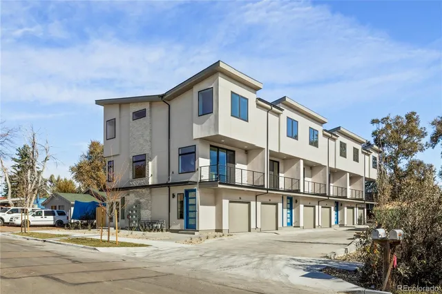 a view of a building with a street