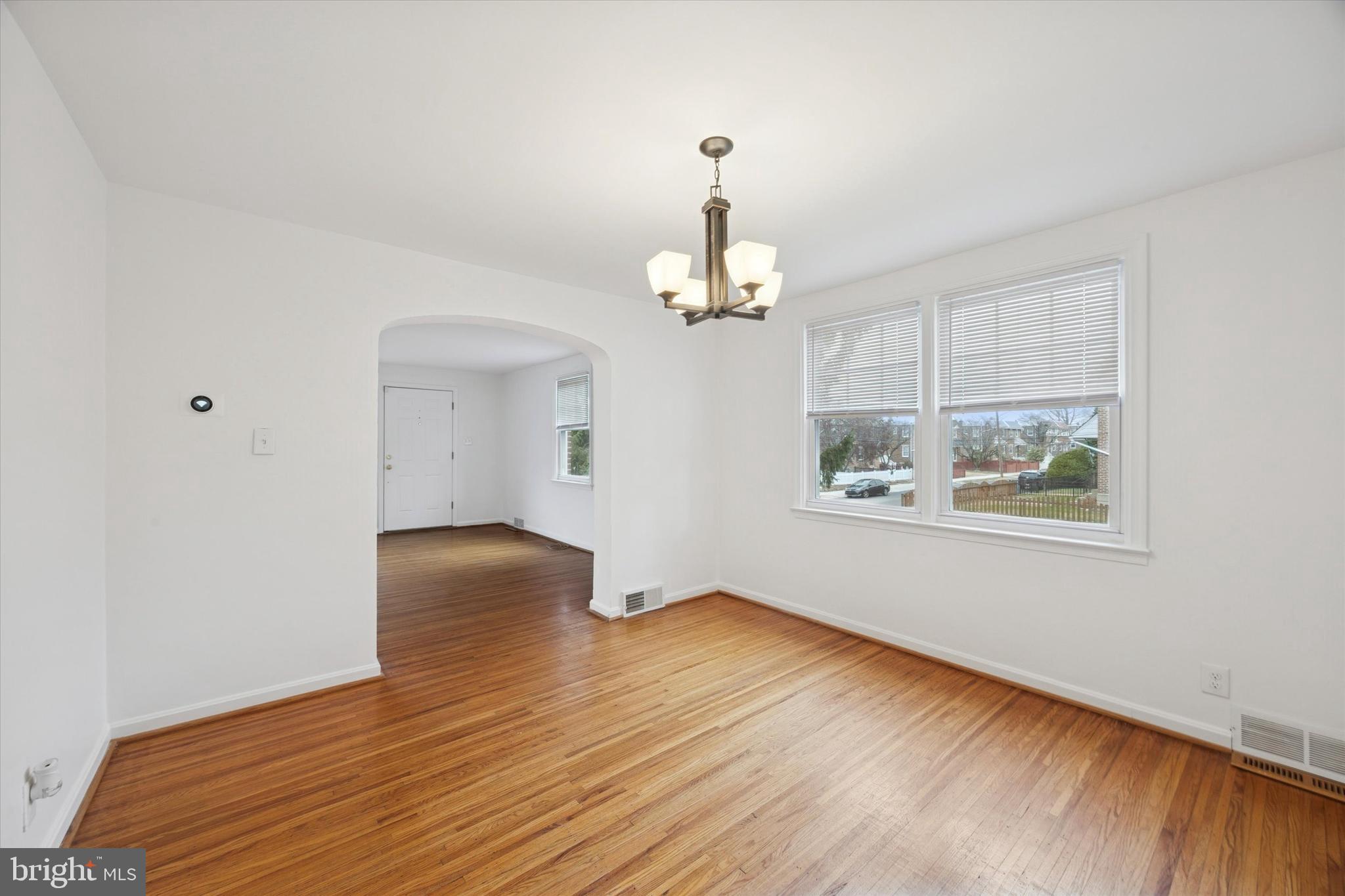 519 Acorn Street Philadelphia, PA 19128 - Photo 11 of 29 a view of livingroom with hardwood floor and window