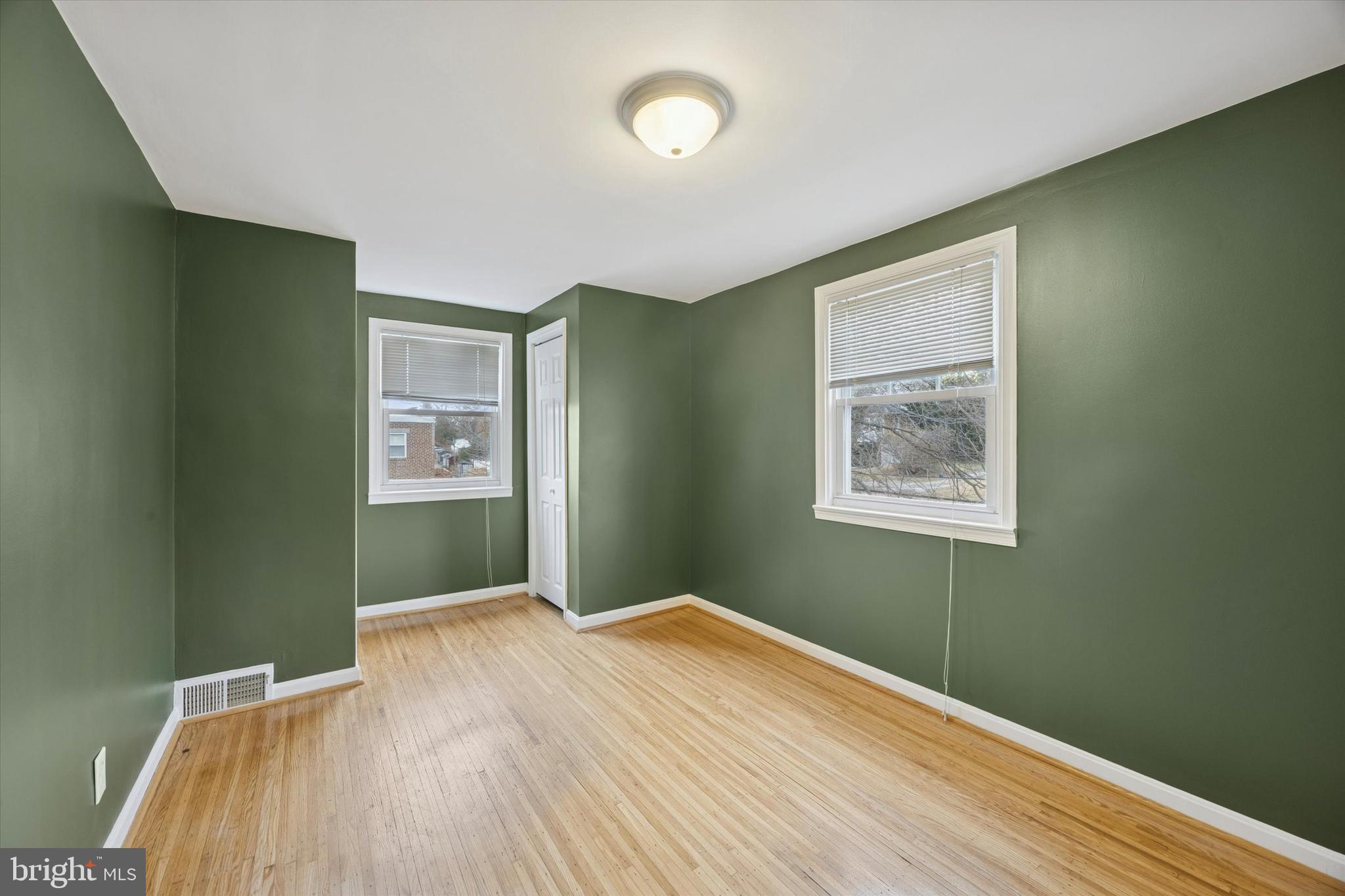 519 Acorn Street Philadelphia, PA 19128 - Photo 16 of 29 a bedroom with a bed and a window