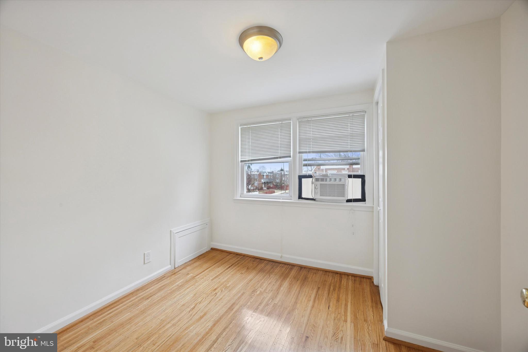519 Acorn Street Philadelphia, PA 19128 - Photo 18 of 29 a view of a room with wooden floor and window