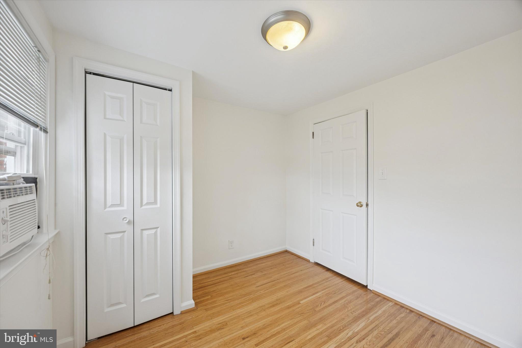 519 Acorn Street Philadelphia, PA 19128 - Photo 20 of 29 a view of an empty room with wooden floor