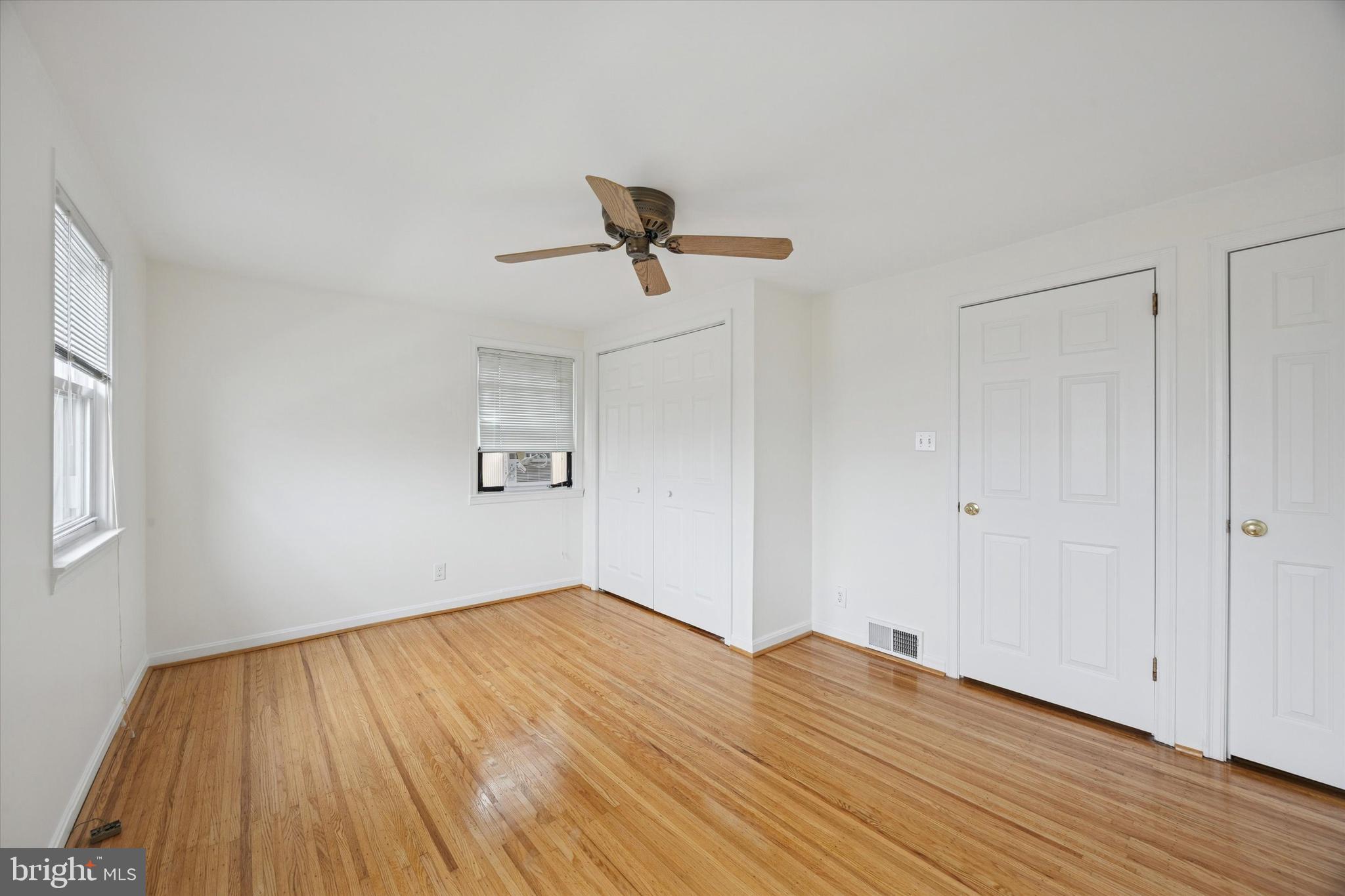 519 Acorn Street Philadelphia, PA 19128 - Photo 23 of 29 a view of empty room with wooden floor and fan
