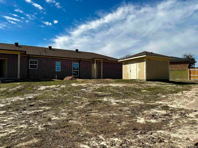 a front view of house with pathway