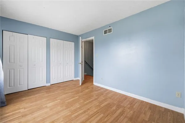 a utility room with cabinets