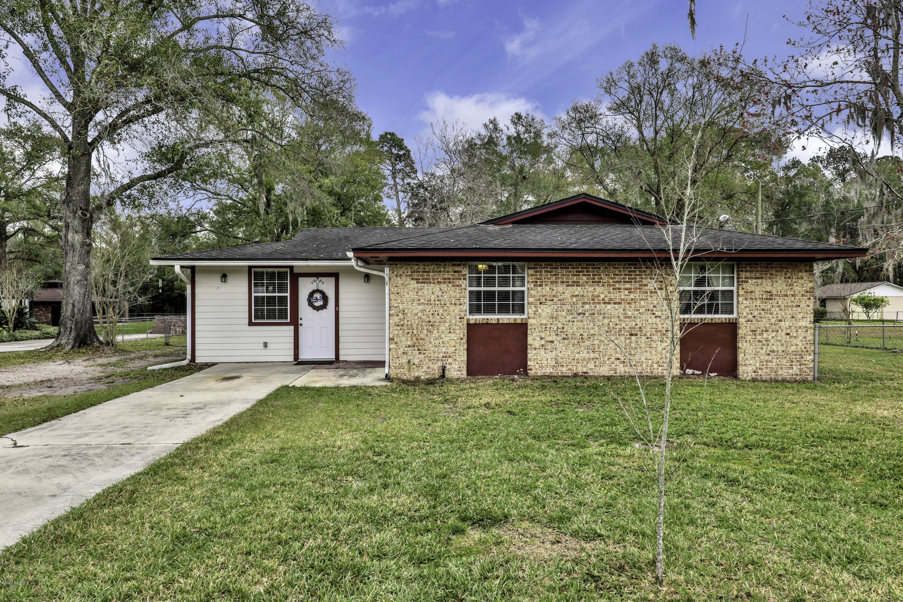 6161 Carlton Road Jacksonville, FL 32244 - Photo 1 of 26 front view of a house with a yard