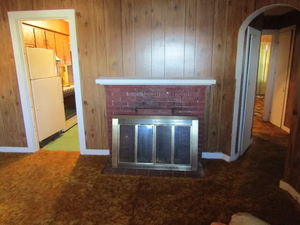 a view of an entryway with a fireplace