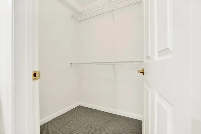 a view of small space with racks on the wall