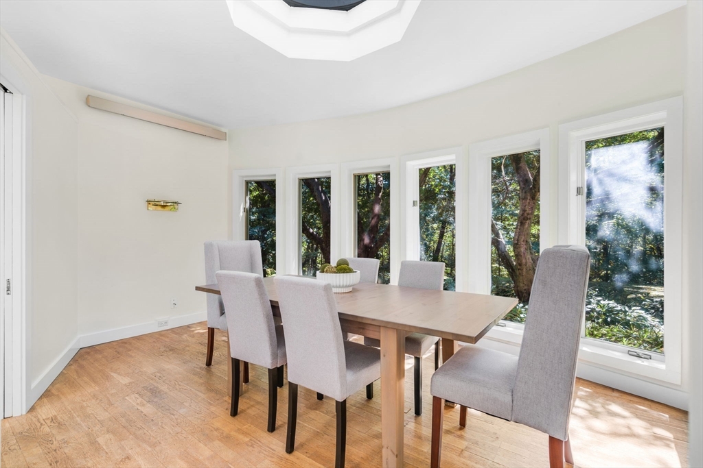 66 Taylor Road Stow, MA 01775 - Photo 13 of 42 a view of a dining room with furniture window and wooden floor