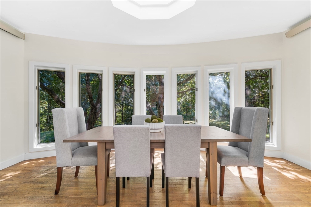66 Taylor Road Stow, MA 01775 - Photo 14 of 42 a view of a dining room with furniture window and wooden floor